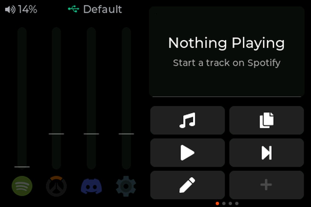 A screenshot captured directly from the Mixlar One device's own display, showing the on-device Spotify widget in its idle "Nothing Playing" state, with the volume level, USB connection status, and six macro tiles visible below it. This crossfades with a second frame of the device's Clock widget.
