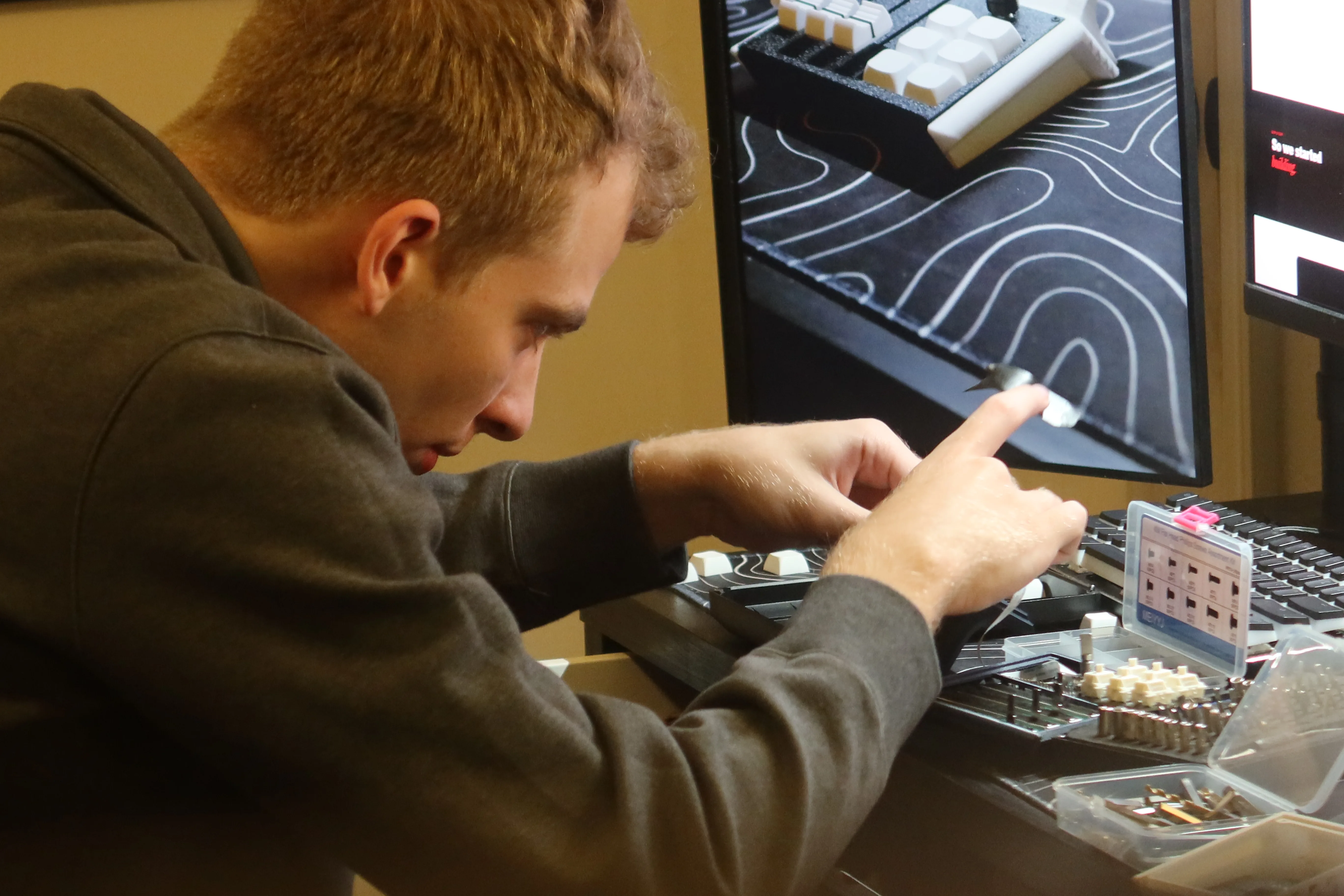 Sam building Mixlar at the workbench